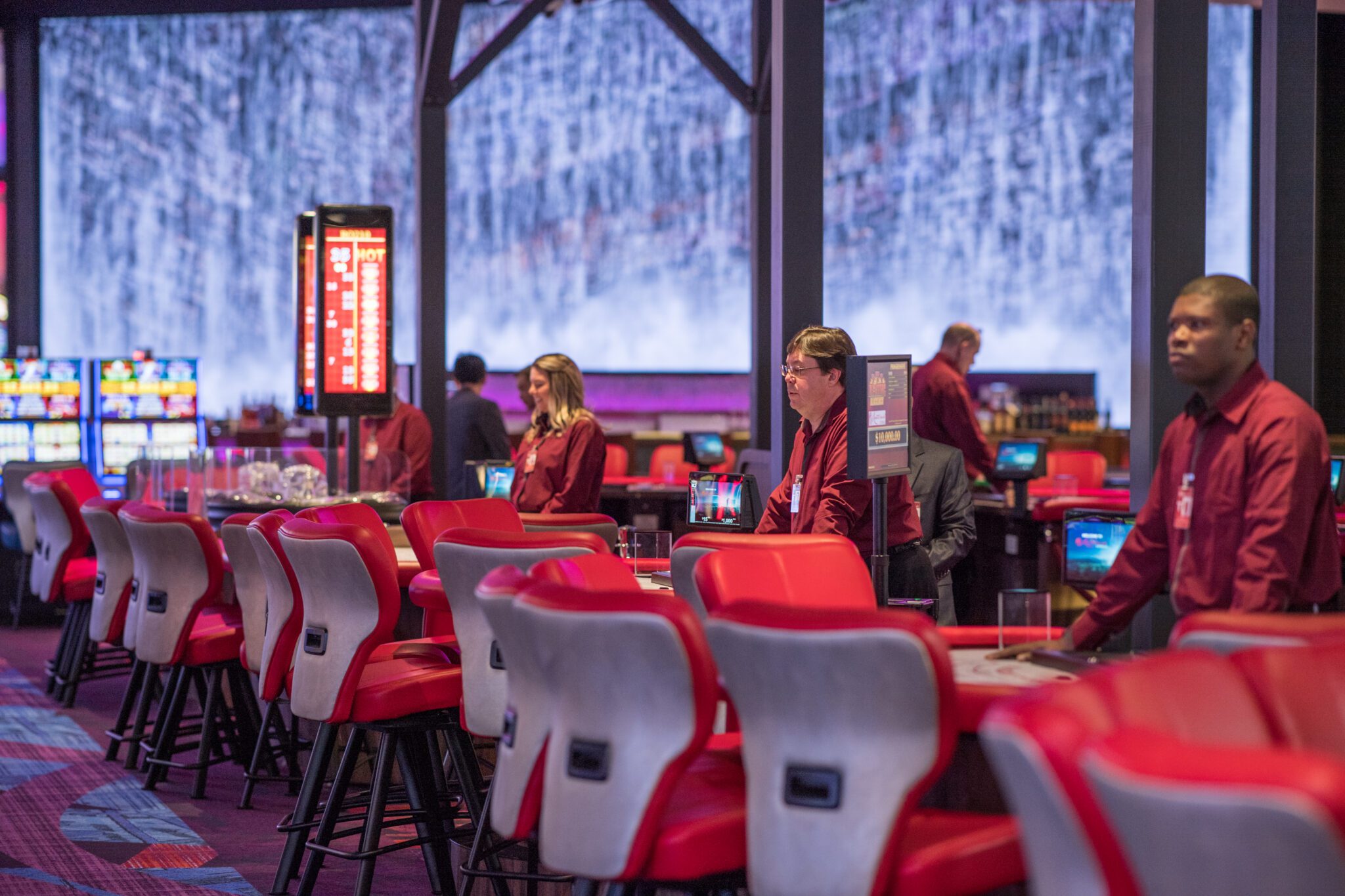 gambling tables and casino staff at resorts world catskills casino resort